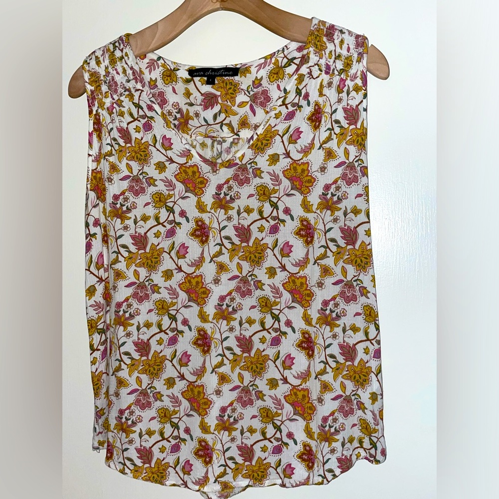 Sleeveless, light as air, flowered top by ava Christine.
